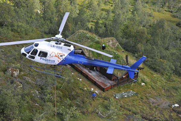 Transport building materials for cottage and cabin by helicopter